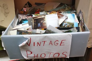 A box of vintage family photographs at Thrift and New. Photo: Anna Irrera. 