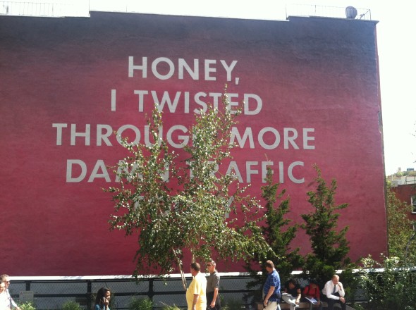 Ed Ruscha’s “Honey, I Twisted Through More Damn Traffic Today,” commissioned by the High Line Art program. The mural is scheduled for a one-year installation period. Photo: Alanna Weissman.