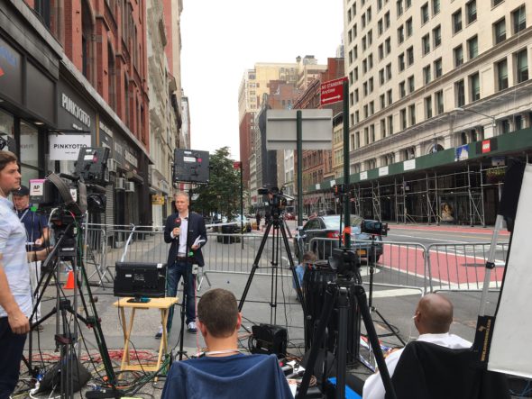 Satellite trucks from news organizations camped out at the police barricade of 23rd Street and Fifth Avenue, where the investigation of Saturday night’s explosion is underway. Photo: Joseph Flaherty.