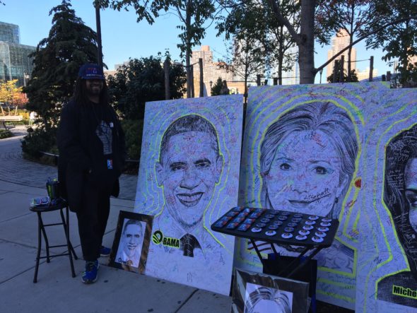 Artist Mark Gaines, who works in ballpoint pen, sells campaign artwork outside the Javits Center. Photo: Joseph Flaherty.