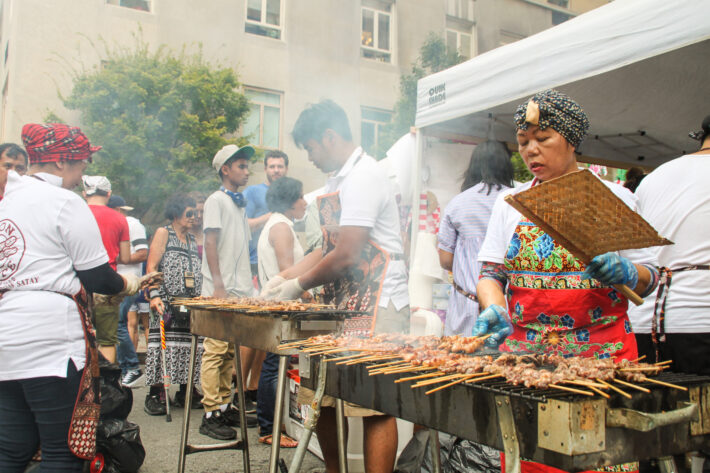 Queues go around the corner for Satay sticks, the most popular dish of the day. 