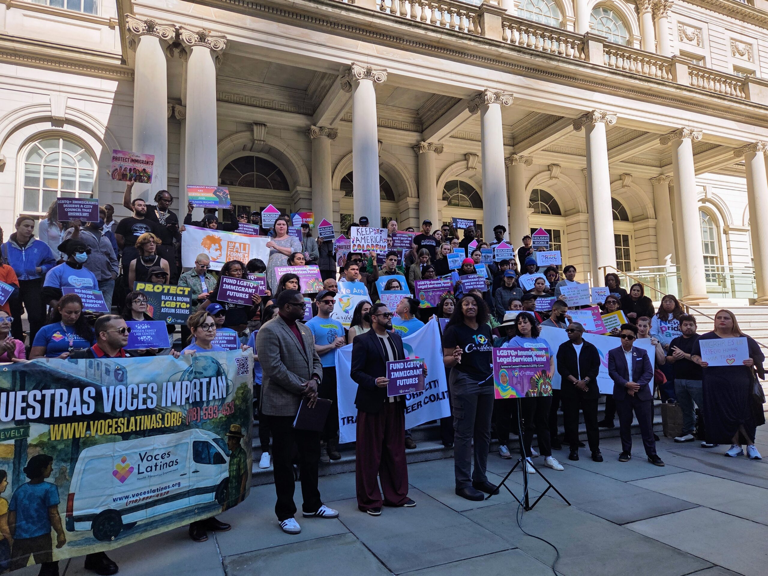 Rally at City Hall calls for $15 million for LGBTQ immigrants